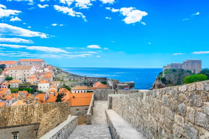 A view towards the sea and the iconic red roofs from Old Town walls